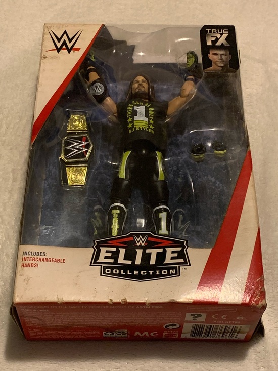 Mattel Other - AJ Styles WWE Elite Action Figure in Box. Never Opened but Box Damaged
